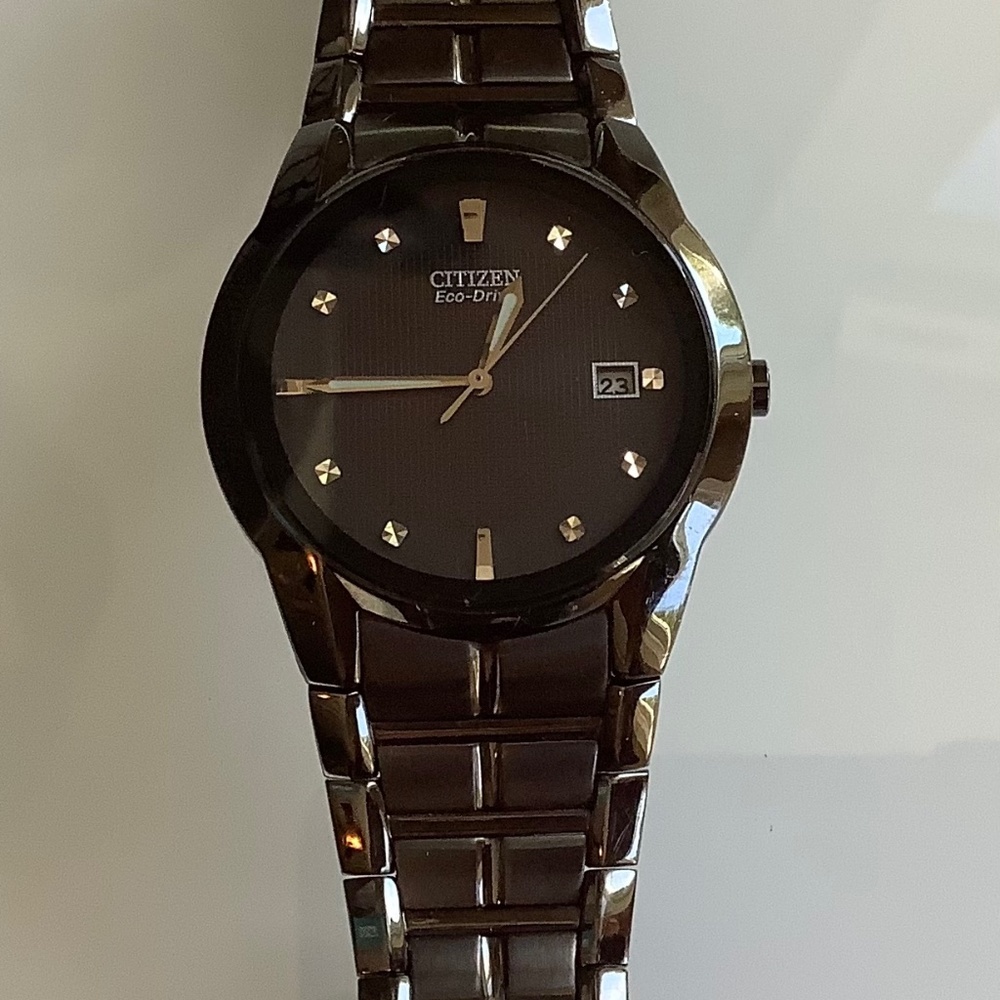 Men’s Citizens eight diamond hour marker, Eco drive watch.